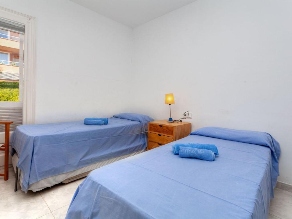 Postel nebo postele na pokoji v ubytování Holiday Home La Reserva II by Interhome