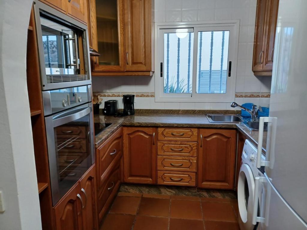 Kuchyň nebo kuchyňský kout v ubytování APARTAMENTO MAYI 2
