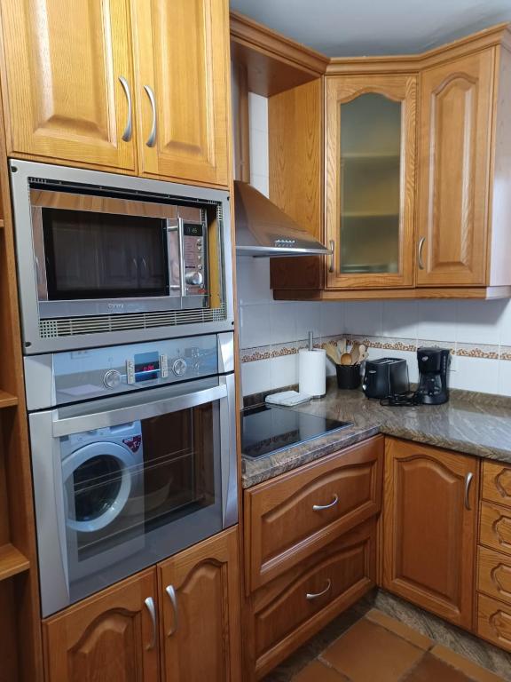Kuchyň nebo kuchyňský kout v ubytování APARTAMENTO MAYI 2