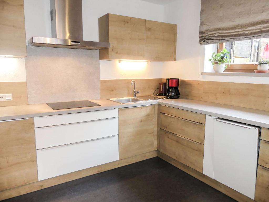 Kuchyň nebo kuchyňský kout v ubytování Apartment Brettfall Blick by Interhome