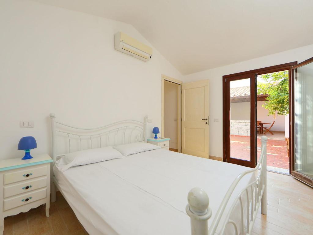 Posteľ alebo postele v izbe v ubytovaní Holiday Home Ville San Pietro - REI352 by Interhome