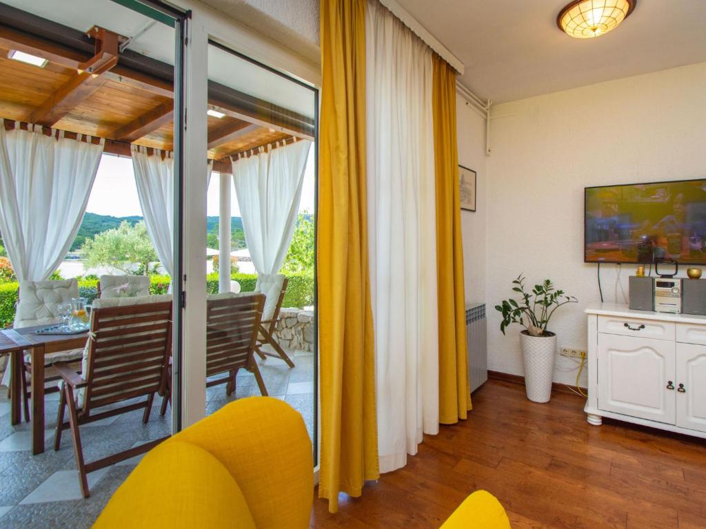 TV a/nebo společenská místnost v ubytování Holiday Home Anka by Interhome