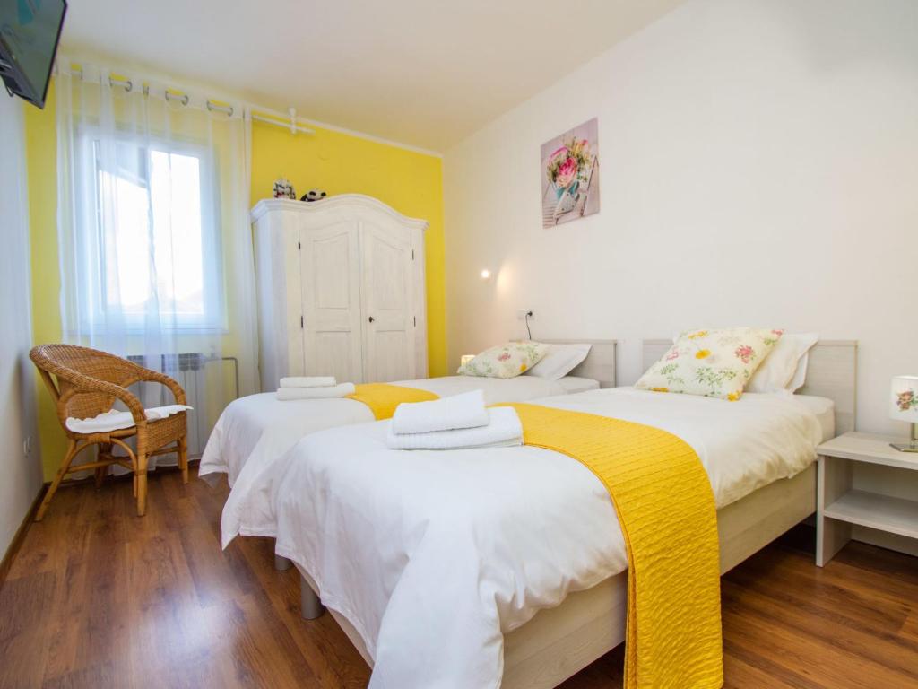 Postel nebo postele na pokoji v ubytování Holiday Home Anka by Interhome