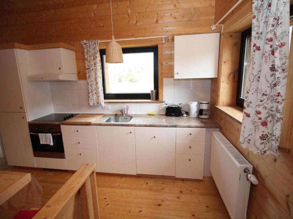 Kuchyň nebo kuchyňský kout v ubytování Apartment Bärenhöhle - Top 6 by Interhome