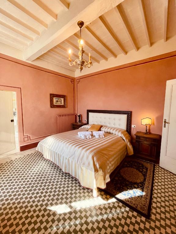 Postel nebo postele na pokoji v ubytování Palazzo Barbini Dimora Storica