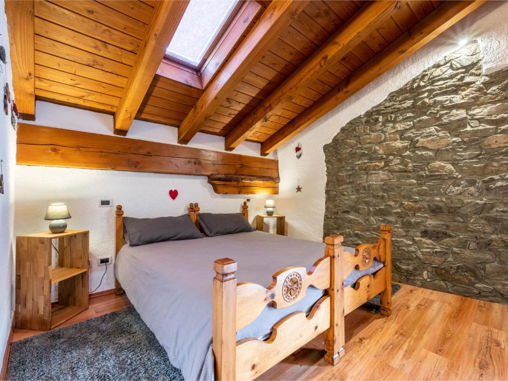 Łóżko lub łóżka w pokoju w obiekcie Apartment Maison Chez Nous by Interhome