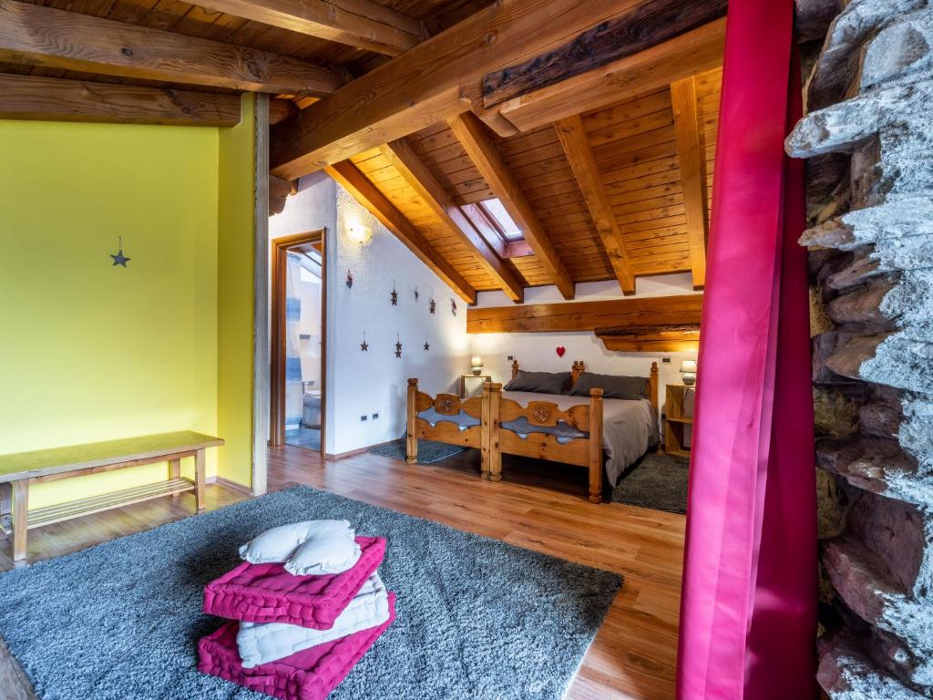 Łóżko lub łóżka w pokoju w obiekcie Apartment Maison Chez Nous by Interhome