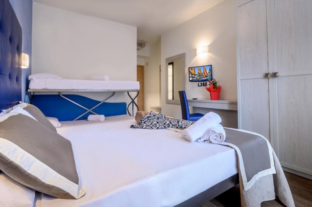 Postel nebo postele na pokoji v ubytování Atlas Hotel