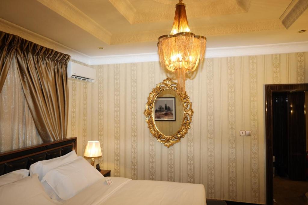 Postel nebo postele na pokoji v ubytování NO.1 HOTEL