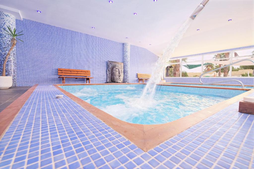 The swimming pool at or close to Hotel Moon Dreams Marina Parc