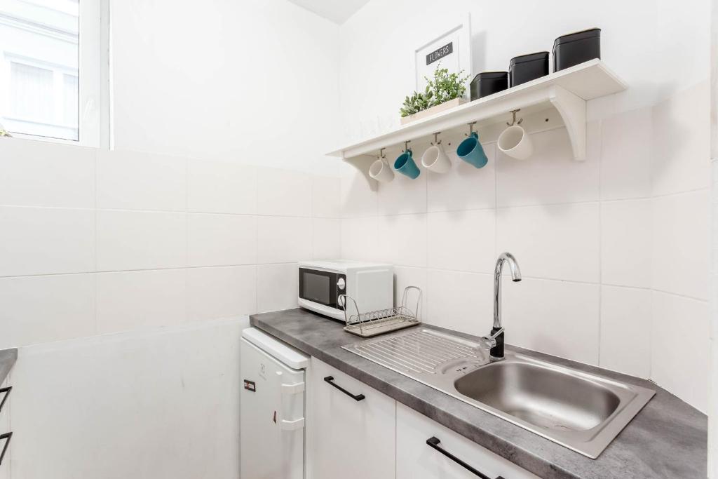 Kuchyňa alebo kuchynka v ubytovaní Chill Apartments Gersona