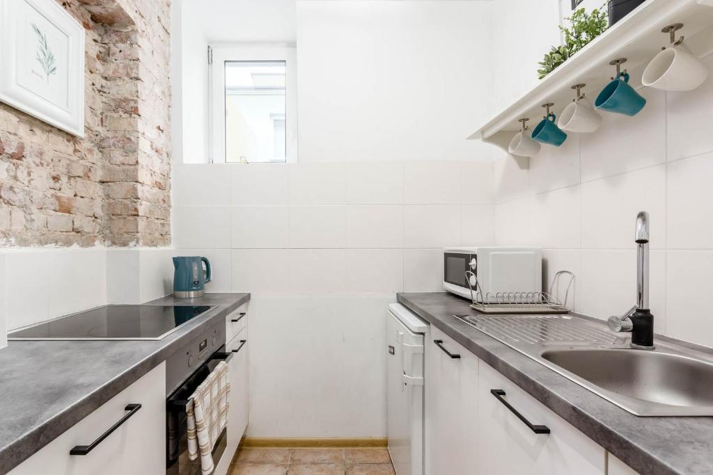 Kuchyňa alebo kuchynka v ubytovaní Chill Apartments Gersona