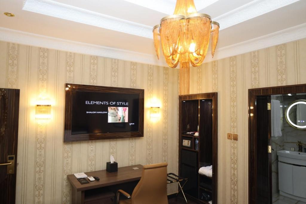 TV a/nebo společenská místnost v ubytování NO.1 HOTEL