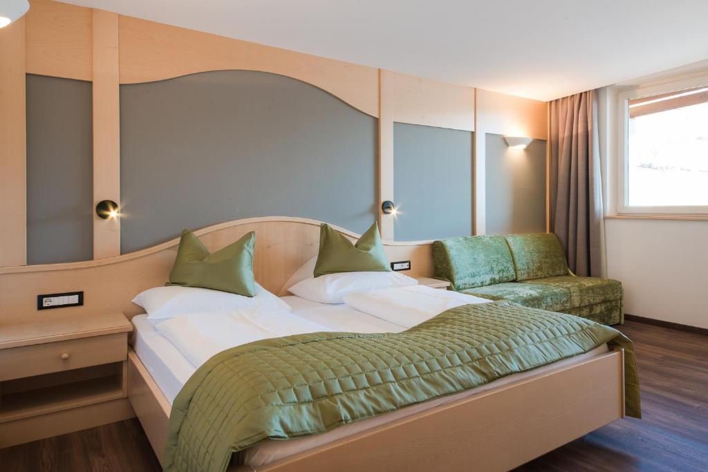 Postel nebo postele na pokoji v ubytování Hotel Salten