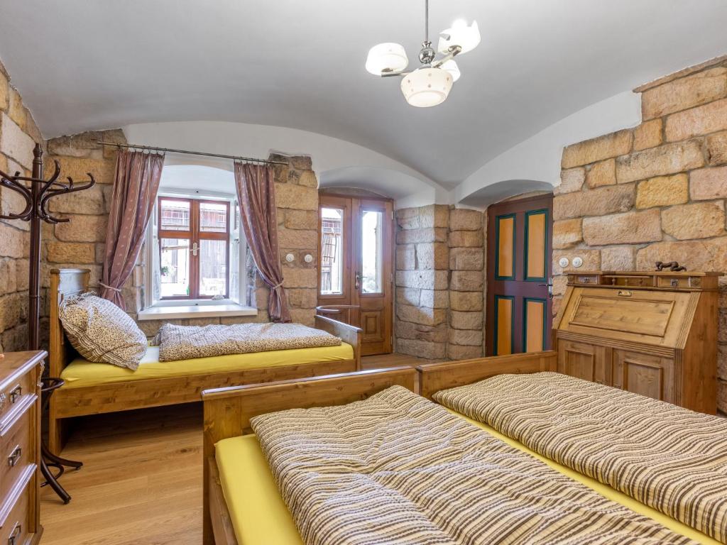 Postel nebo postele na pokoji v ubytování Holiday Home Dolní Olešnice by Interhome