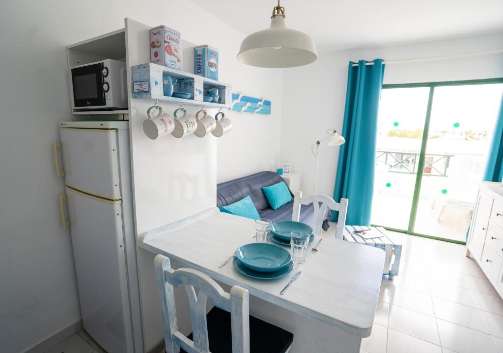 Kuchyň nebo kuchyňský kout v ubytování Sea Breeze Apartment 309