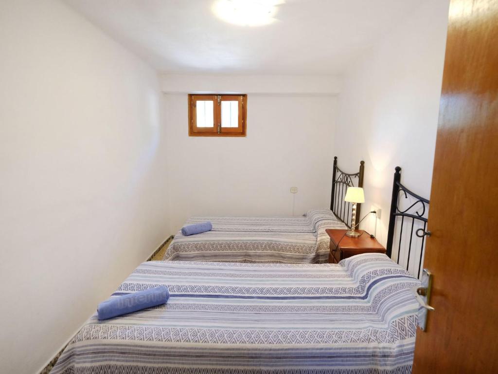 Posteľ alebo postele v izbe v ubytovaní Holiday Home Pino by Interhome