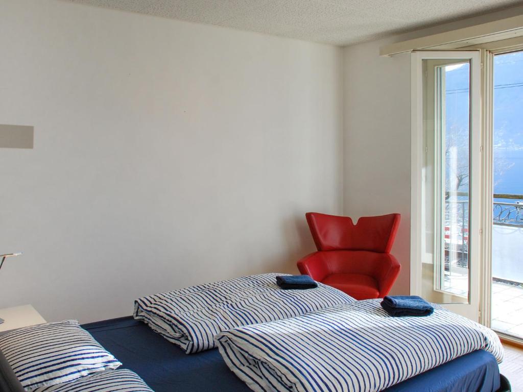Postel nebo postele na pokoji v ubytování Apartment San Quirico by Interhome