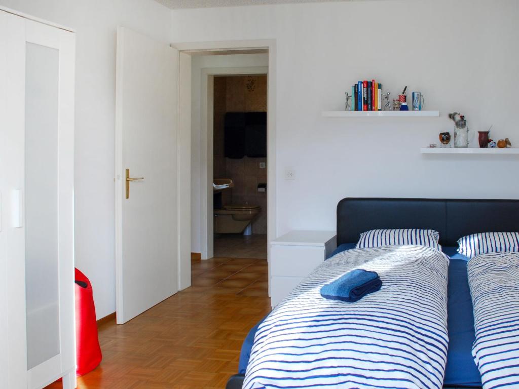 Postel nebo postele na pokoji v ubytování Apartment San Quirico by Interhome