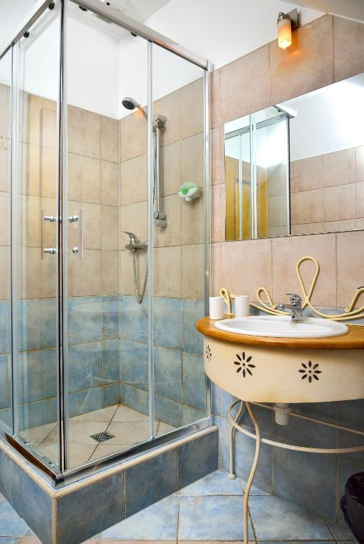 Koupelna v ubytování Hotel Via Ironia