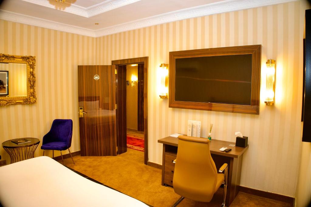 Postel nebo postele na pokoji v ubytování NO.1 HOTEL