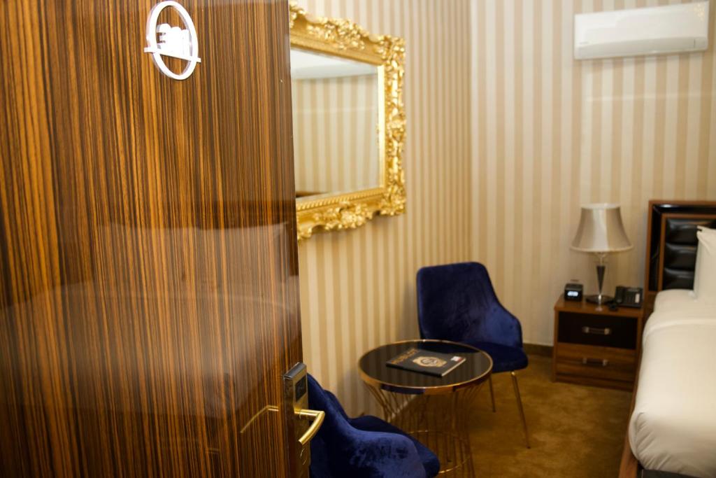 Postel nebo postele na pokoji v ubytování NO.1 HOTEL