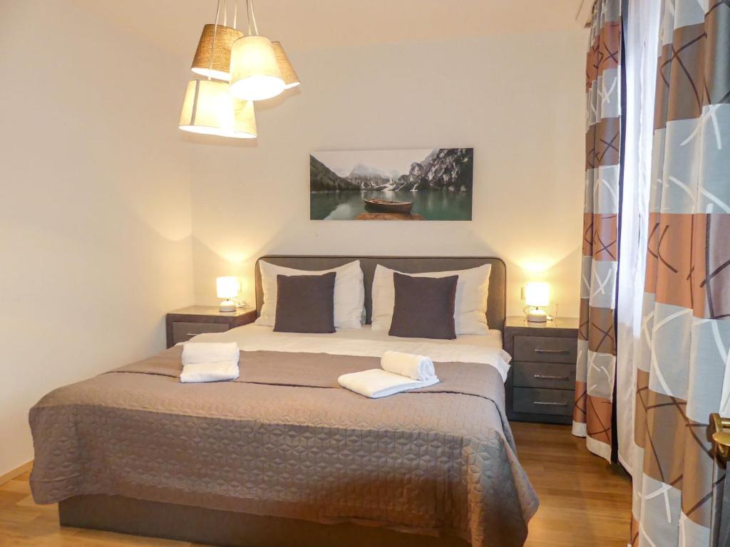 A bed or beds in a room at Apartment Sigel by Interhome
