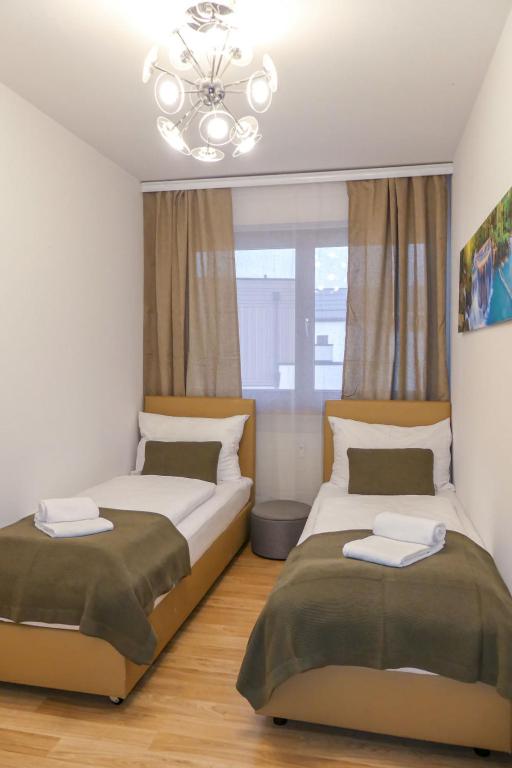 A bed or beds in a room at Apartment Sigel by Interhome