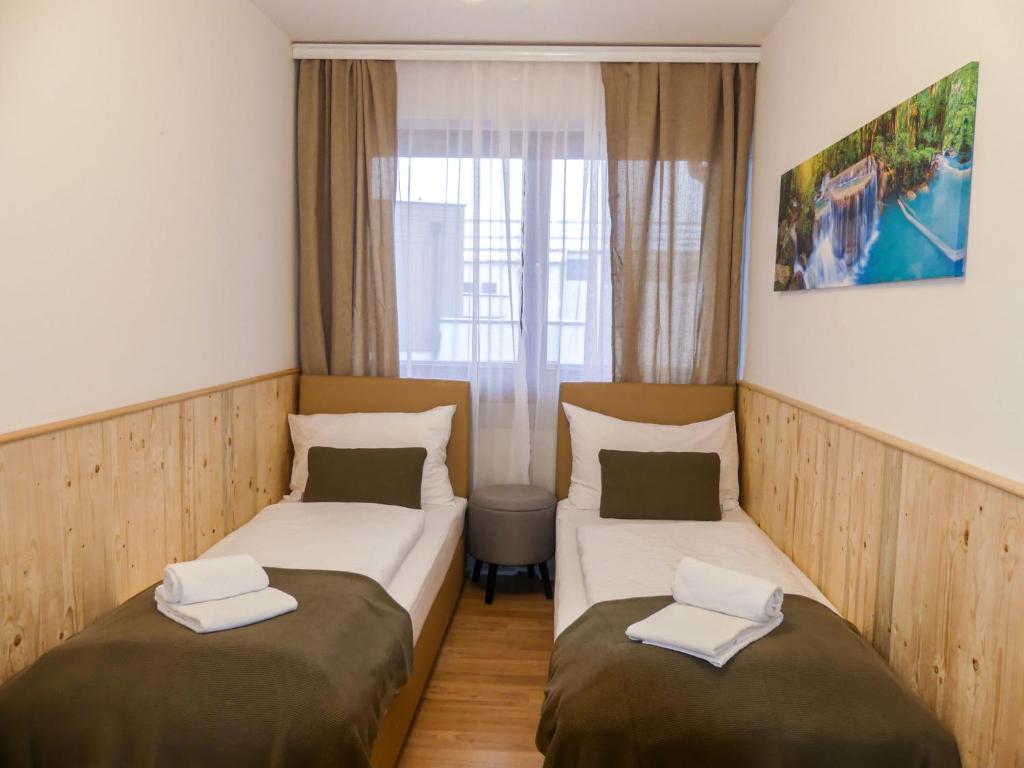 A bed or beds in a room at Apartment Sigel by Interhome