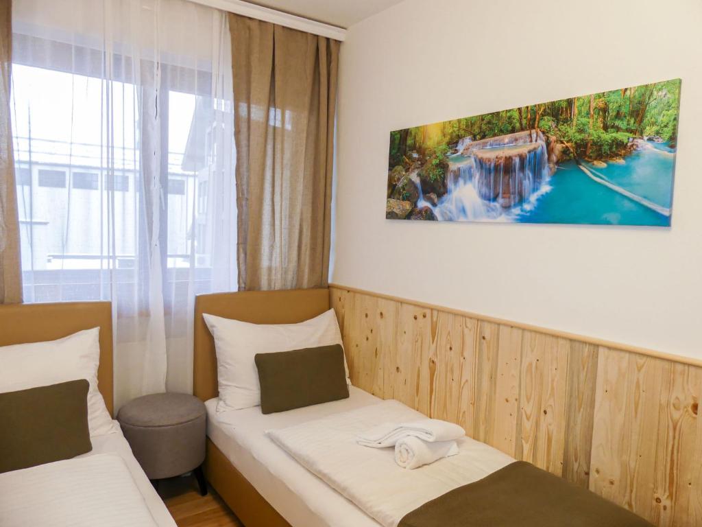 A bed or beds in a room at Apartment Sigel by Interhome