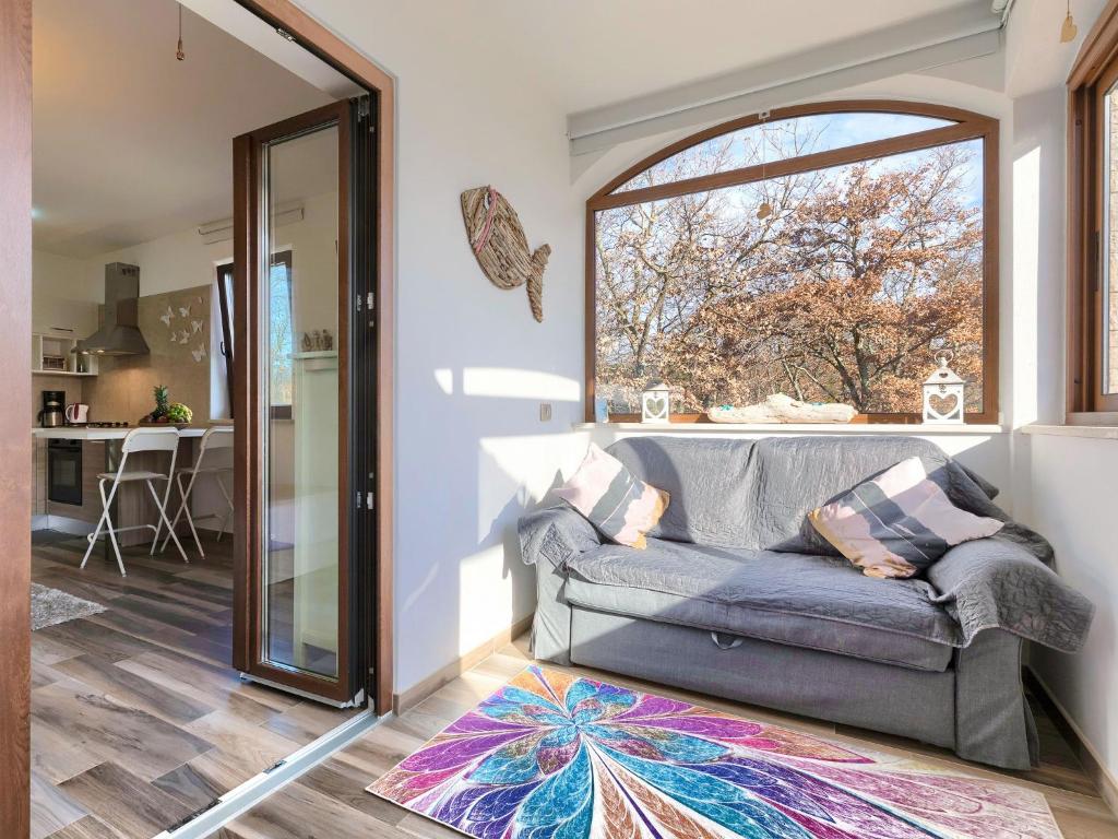 Część wypoczynkowa w obiekcie Holiday Home Villa Amaii by Interhome