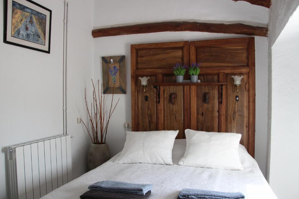 Postel nebo postele na pokoji v ubytování Casa de Familia Cortijo La Cubertilla