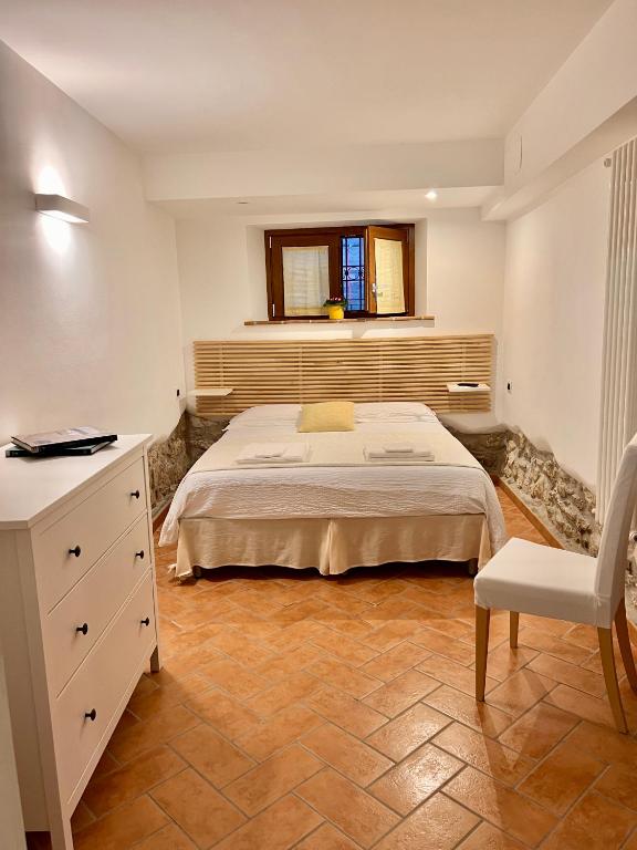 Postel nebo postele na pokoji v ubytování LO SCRIGNO COUNTRY HOUSE