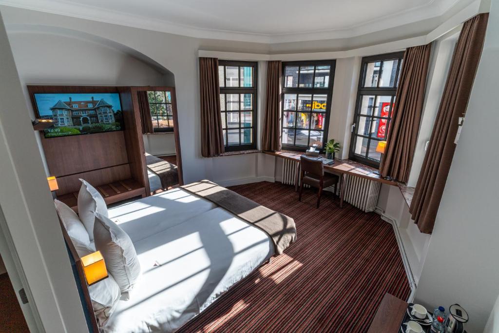 Postel nebo postele na pokoji v ubytování Hotel Villa Monte