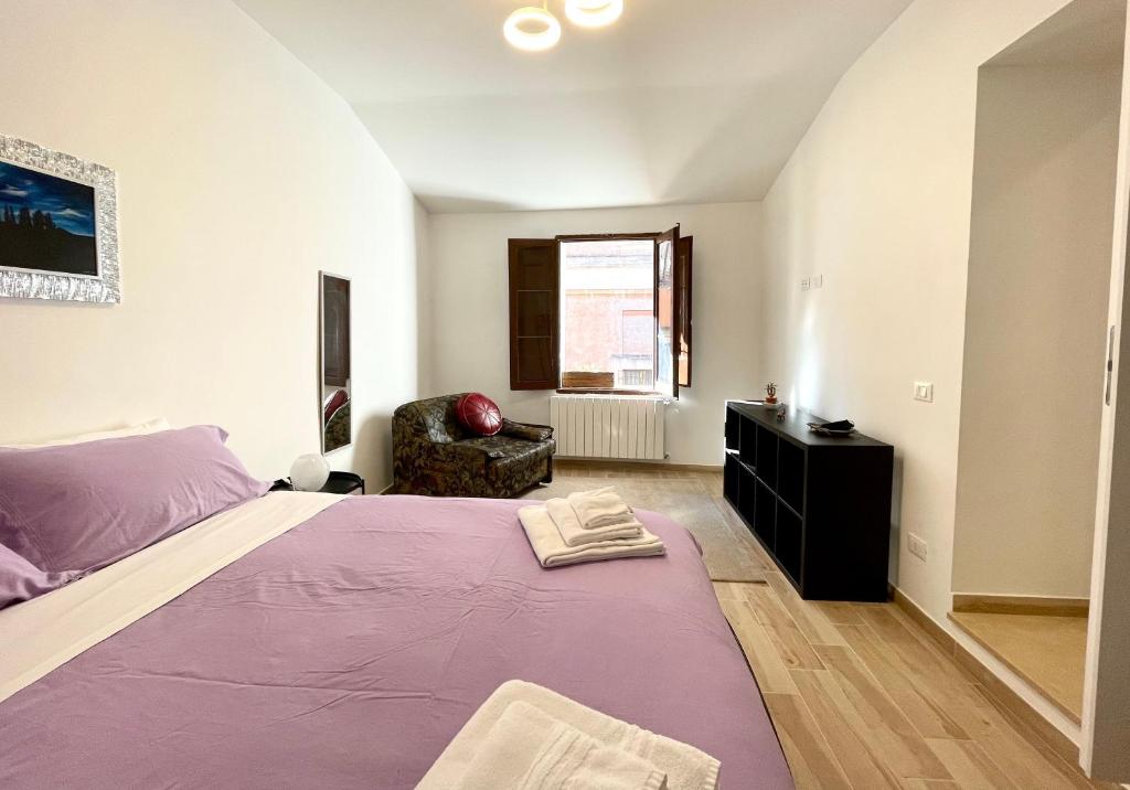 Posteľ alebo postele v izbe v ubytovaní Residenza Antico Portico