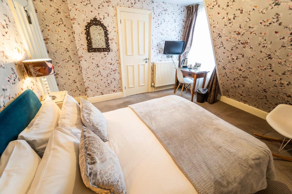 Postel nebo postele na pokoji v ubytování Brooks Guesthouse