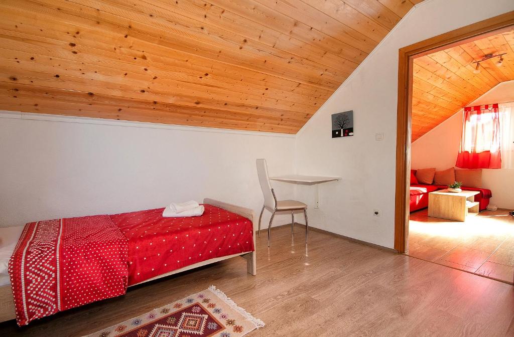 Postel nebo postele na pokoji v ubytování Apartment Ilija