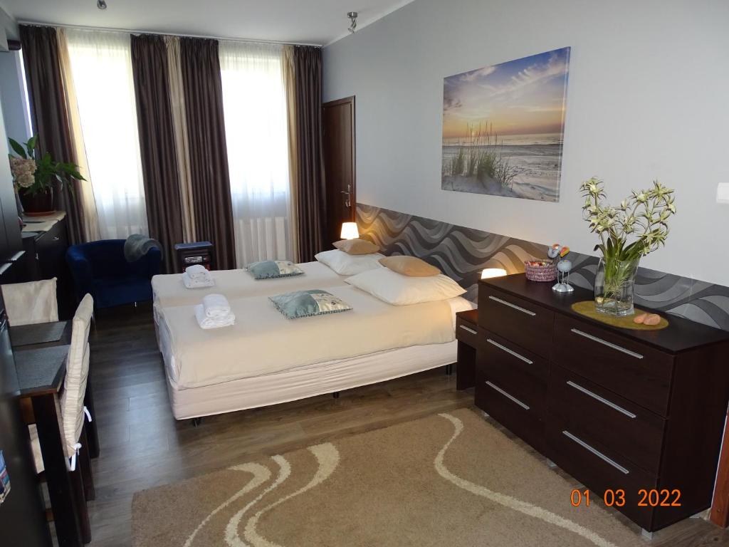 Postel nebo postele na pokoji v ubytování Noclegi nad Morzem u Kasi