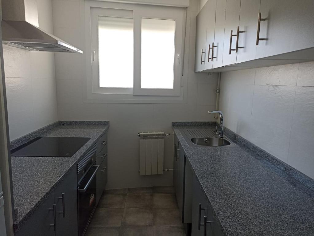 Η κουζίνα ή μικρή κουζίνα στο Apartamento Barbadillo - Redmansur