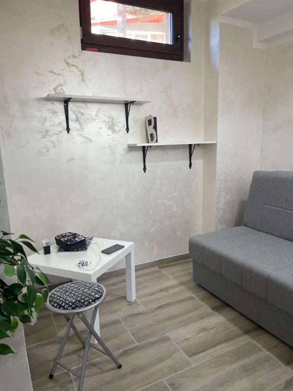 Ein Sitzbereich in der Unterkunft Apartman Una