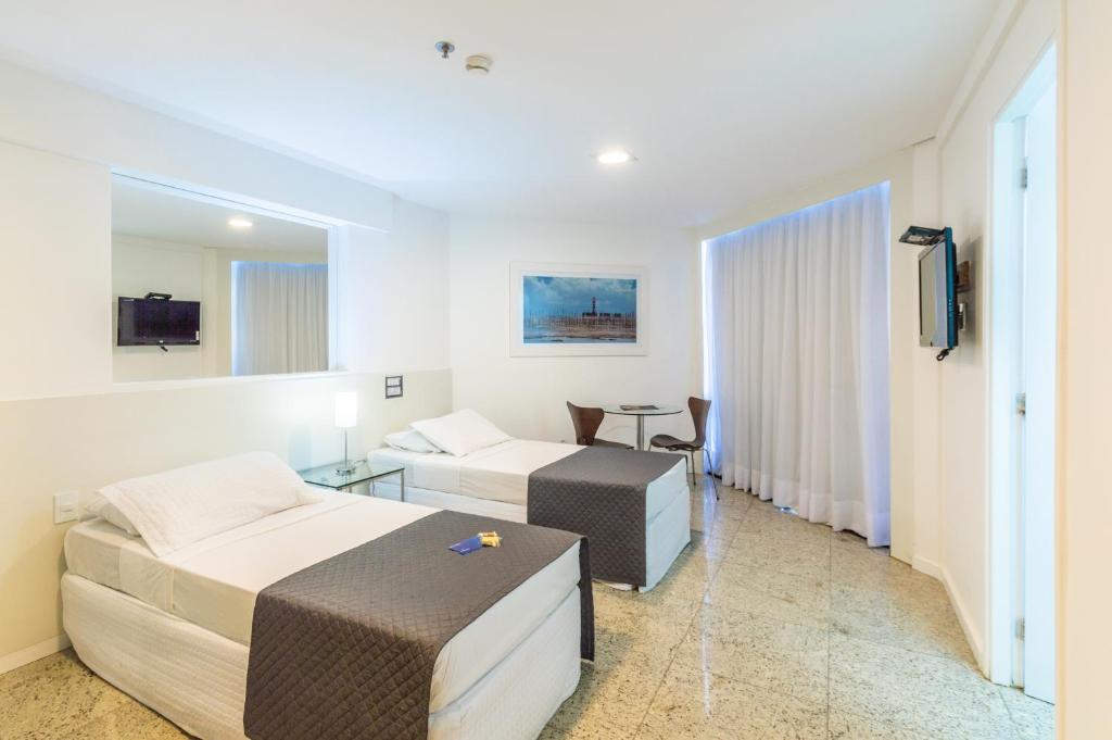 TV a/nebo společenská místnost v ubytování Hotel Brisa Tower Maceió