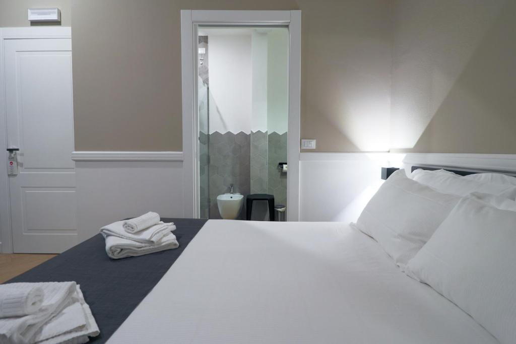 Łóżko lub łóżka w pokoju w obiekcie Elisabeth Boutique Rooms