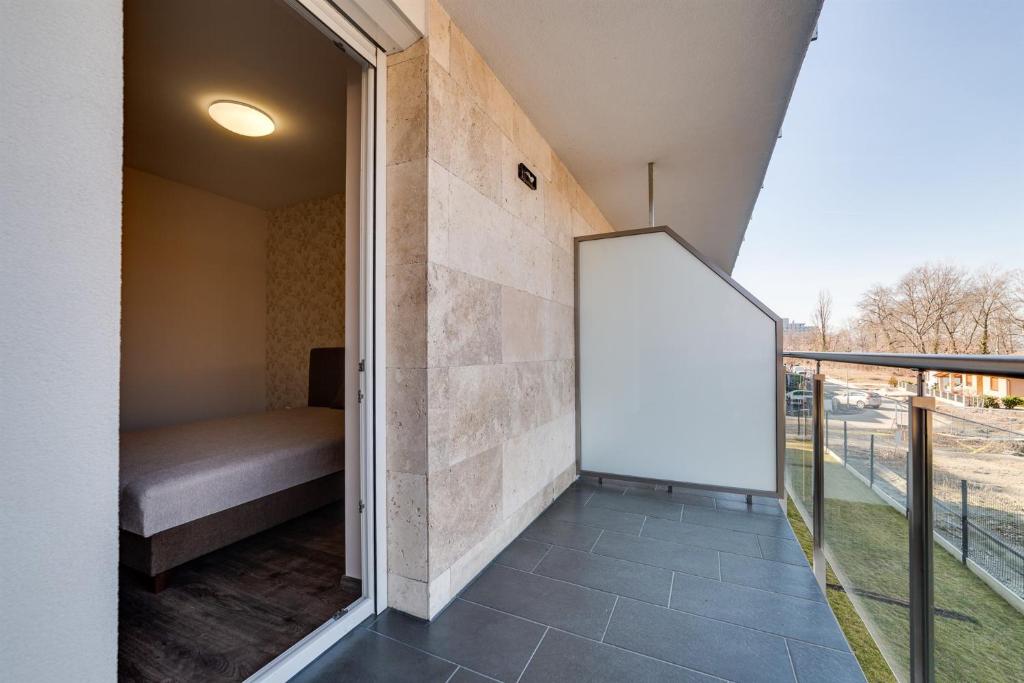 Balkón nebo terasa v ubytování Forest Földvár Apartmanok By BLTN