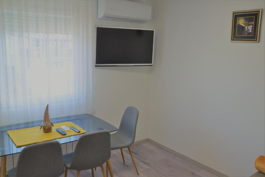 TV a/nebo společenská místnost v ubytování Apartma Vila Zigmund