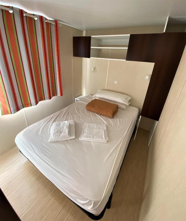 A bed or beds in a room at Camping Igara de San Sebastian