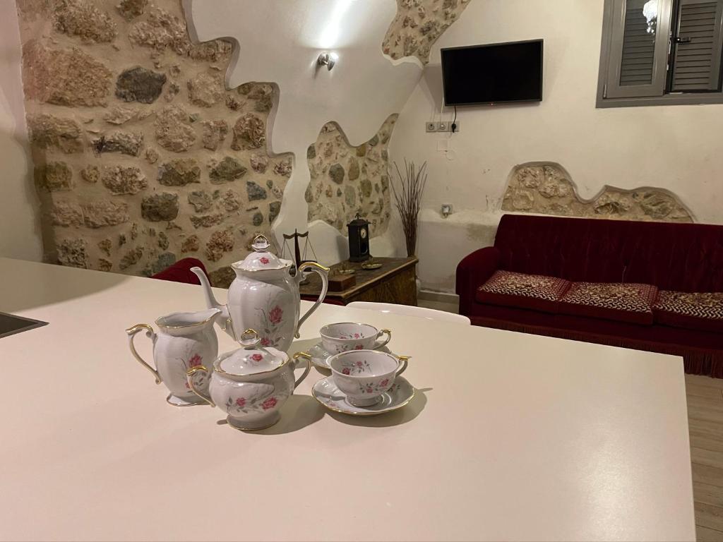 TV a/nebo společenská místnost v ubytování Καμάρα Χωριό Φοινίκι , Kamara Finiki Village
