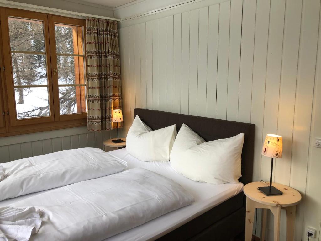 Postel nebo postele na pokoji v ubytování Gasthaus Spinas