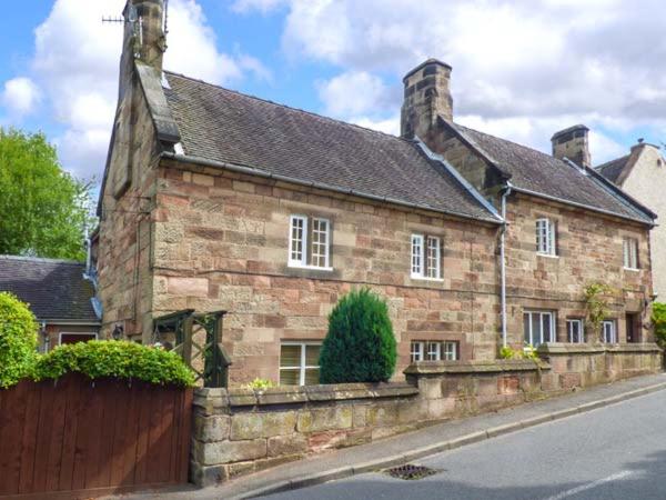 an old brick building with at Ash House in Alton