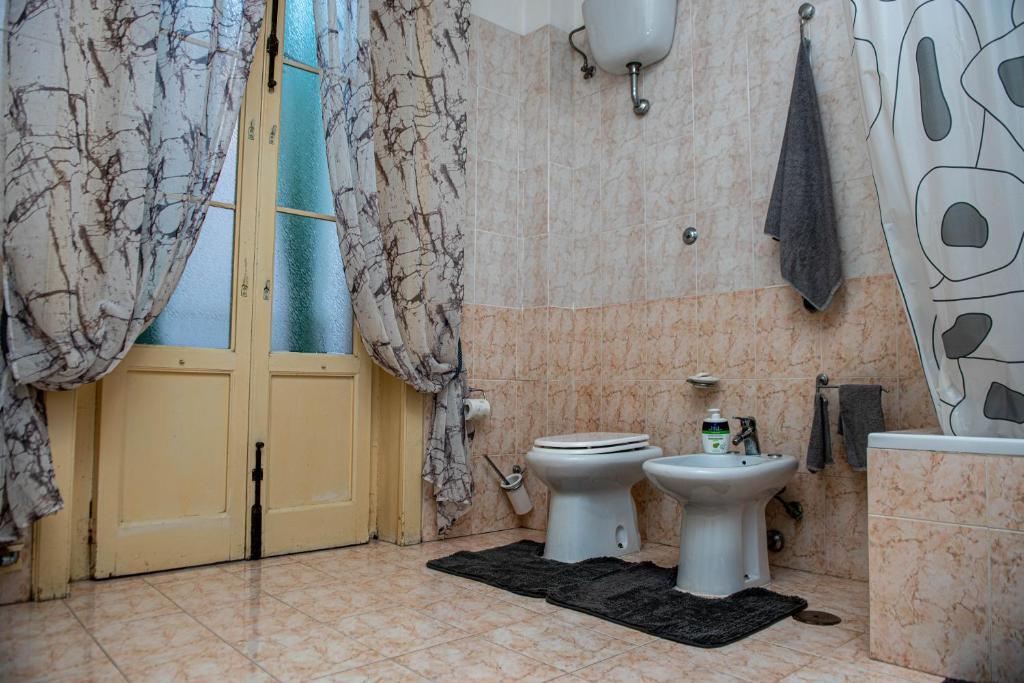 Koupelna v ubytování Pitagora House
