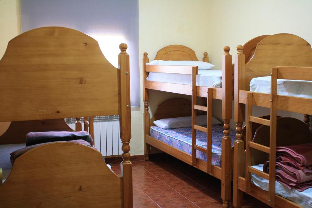 Postel nebo postele na pokoji v ubytování Albergue Los Chorros